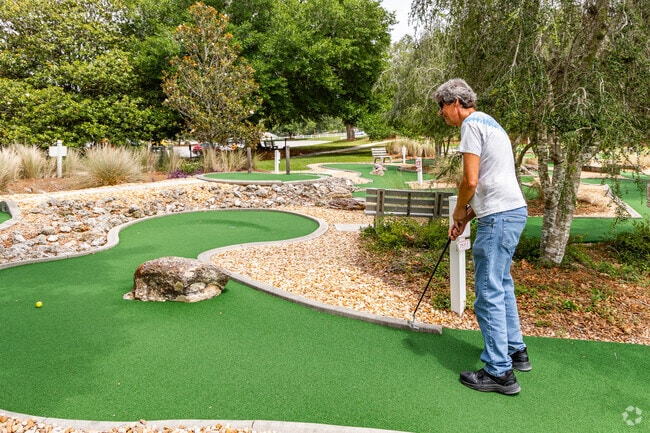 On Top of the World offers a wide range of amenities, including a charming putt-putt course perfect for leisurely fun.