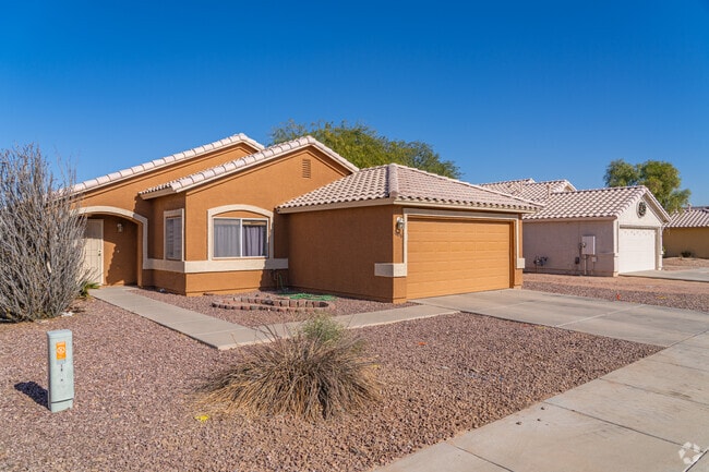 The homes have Mediterranean design elements like clay-tiled roofs in Wildflower Ranch.