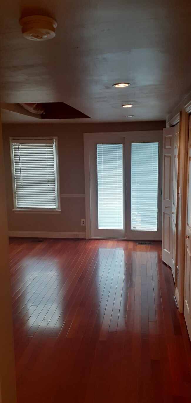 Main bedroom with balcony