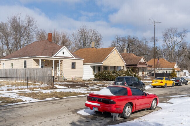 Small vinyl sided homes are a common style of architecture in The Avenues.