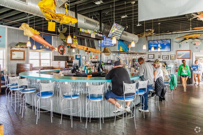 The restaurant at the Ocean View Fishing Pier has indoor and outdoor seating.