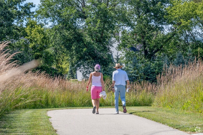 Sheiffer Park in Janesville also has paved paths for residents to traverse.