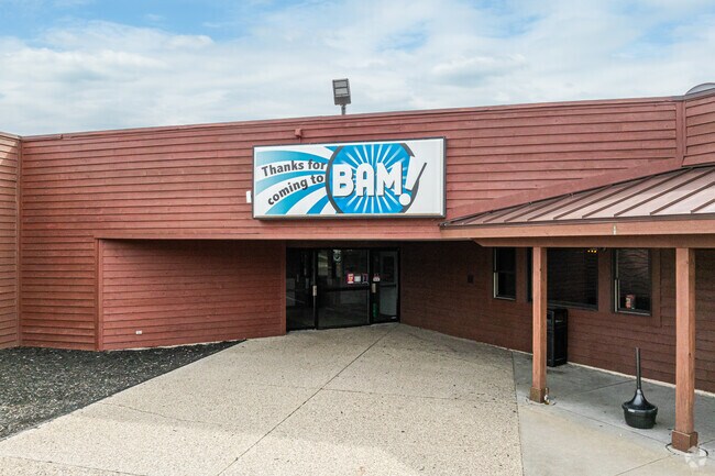 Bam! Entertainment Center has an indoor bowling alley and laser tag arena for Rosa Parks Green.