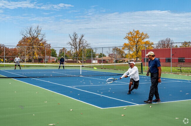 Game. Set. Match. Play a game of tennis at Comstock Park in Schaefer 7-8 Lodge.