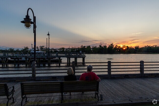 Upper Downtown offers spectacular sunset views over the water of the Cape Fear River.