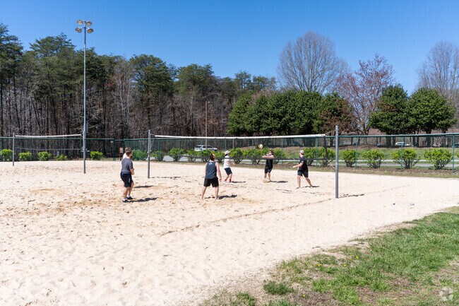 You can enjoy the sand volleyball courts with your friends at Triad Park near Abbotts Creek.