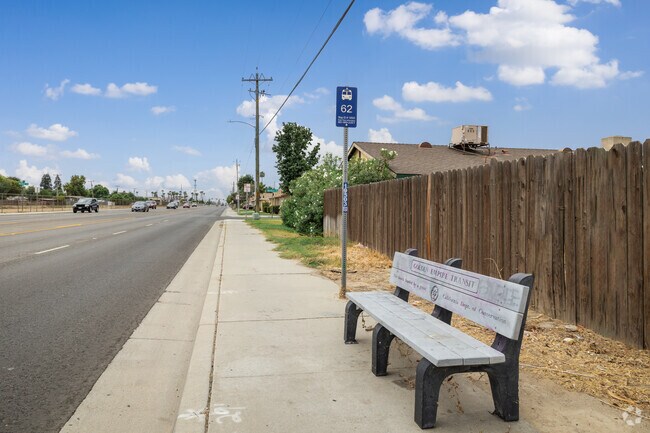 A bench for residents to take a rest while they wait for the bus seen in South Wible Orchard.