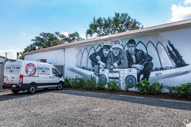 In Charleston’s North of Morrison neighborhood, well-designed murals brighten the sides of many local businesses.