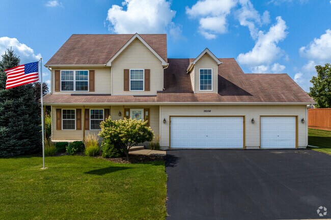 Modern traditional homes with plenty of yard space line the streets in South DuPage River.