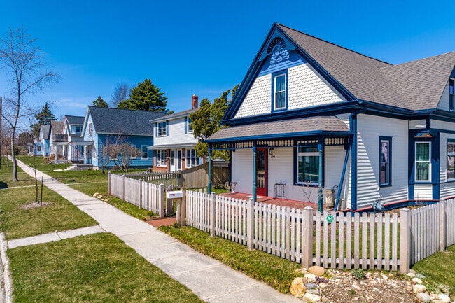 A picket fence decorating a home in Port Washington.