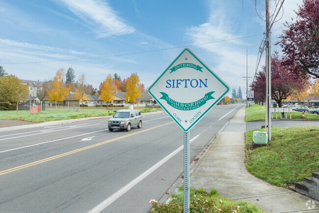 A sign on NE 99th St welcomes you to the North Sifton-Orchards area.
