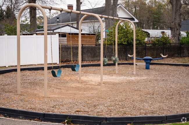 Enjoy the playground swings at Georgia Street Park.