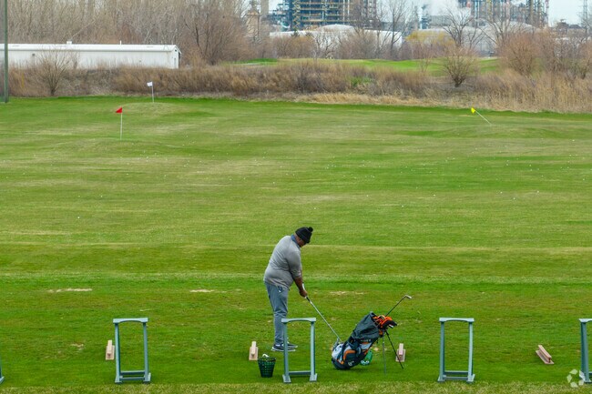 Hit some balls at the driving range at Lost Marsh Golf Course in Whiting.
