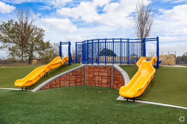 Younger kids can play on the turf playground at Harrison Park by Park Meadows.