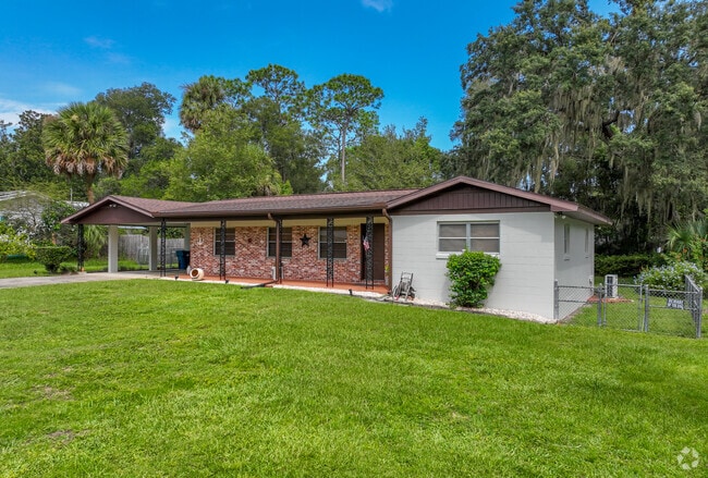 Brick facades and natural elements are common sights along the streets of West Deland.
