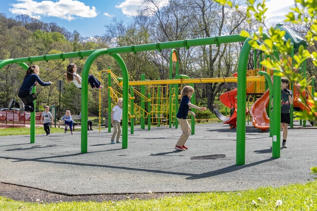 Kids enjoy running and swinging at Sewickley Valley War Memorial Park.