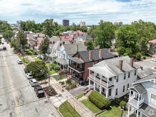 A row of homes lines an Olde Town-Pinched Gut street facing downtown Augusta.