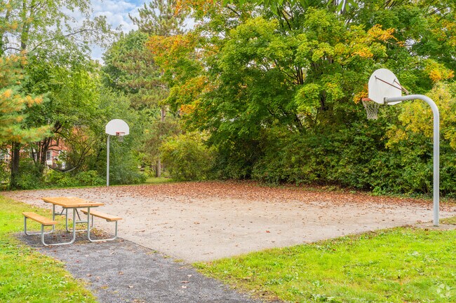 Play a game of basketball with friends on the court at South Hills Park.