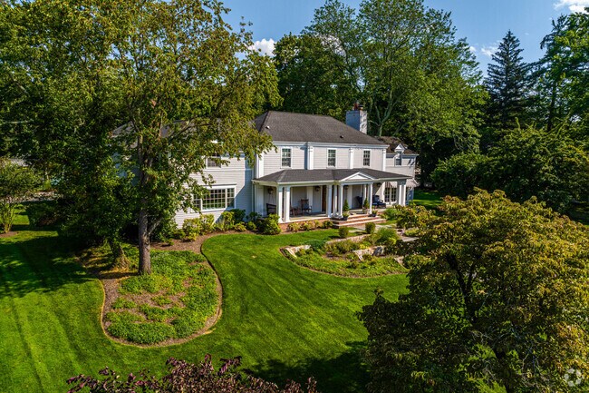 Homes in Essex Fells are often surrounded by scenic trees.