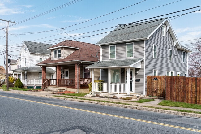 Small colonial and craftsman homes sit side by side along this street in West Catasauqua.