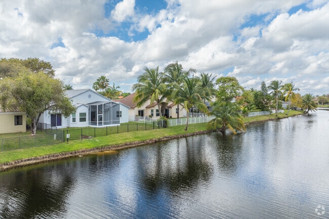 Experience the allure of Hillsboro Ranches' water-view homes, each radiating stunning elegance.