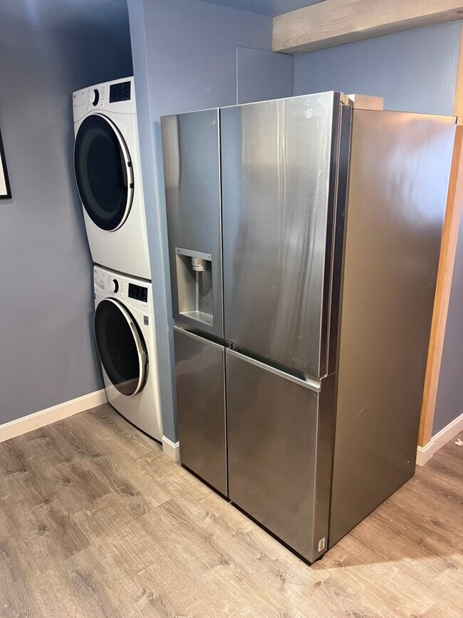 Fridge / Freezer & Stacked Washer and Dryer