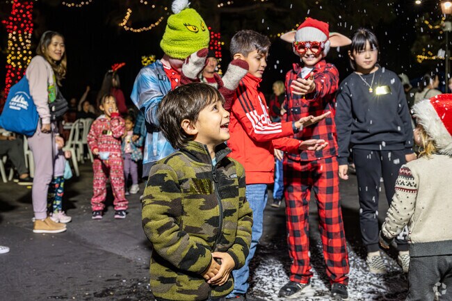 Families love the artificial snow at the many Holiday events of Yorba Linda.