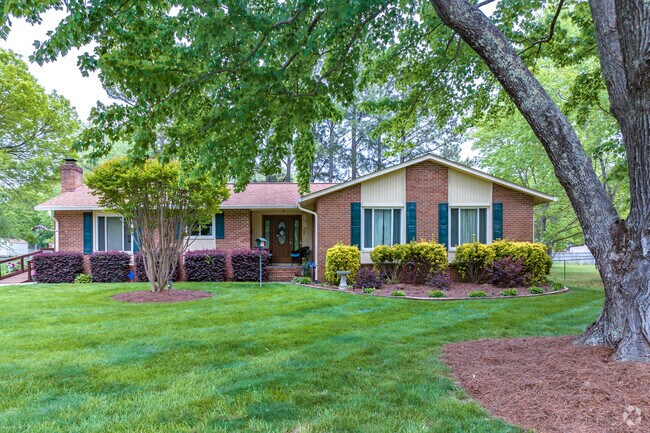 Mature trees provide shade for the older Ranch Style homes in Festival Park.