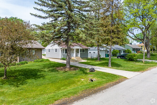 Colorful single-story homes line a popular residential street in Clarendon Hills.