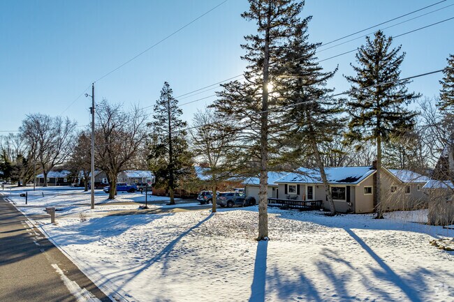 Mid-range homes line the residential streets surrounding the central hub of downtown Fenton.