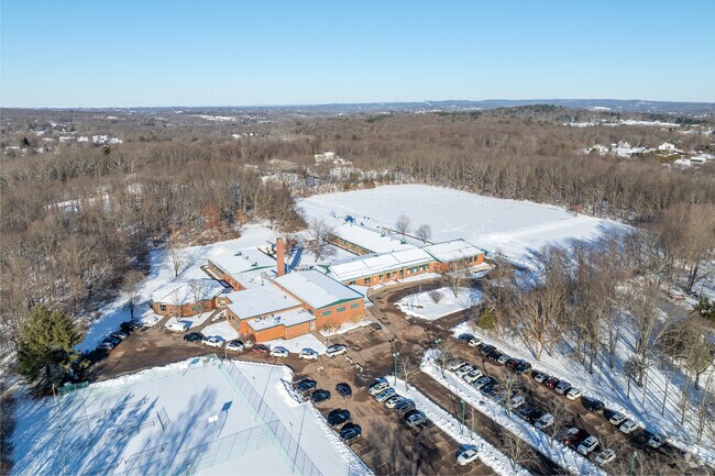 The student population of Middlefield Memorial School is 230.