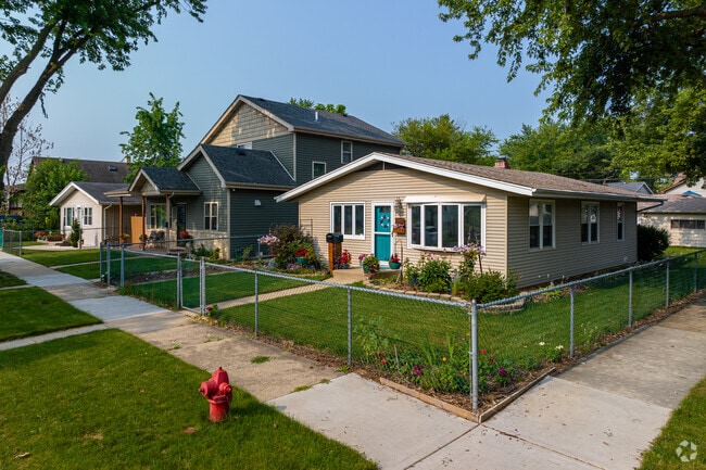 A beautiful row of homes displaying the popular home styles of Posen.