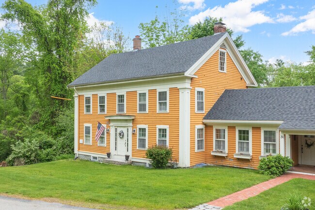 A timeless Colonial home that captures the elegance and heritage of New England living.