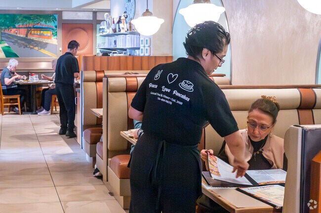 The nearby Great Neck Diner offers all day breakfast where everyohe knows your name.