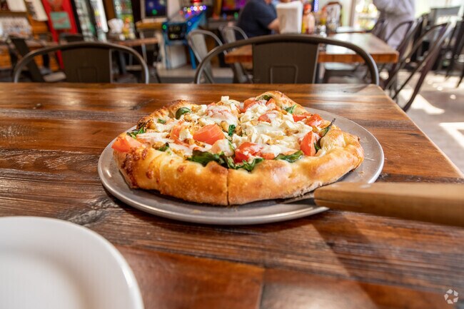 Pizza for lunch at Deno's Pizzeria in the Bryant Neighborhood.