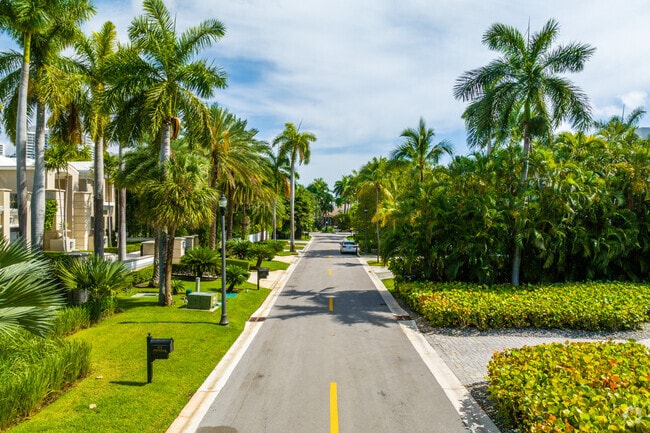 Residential street with large single family homes.