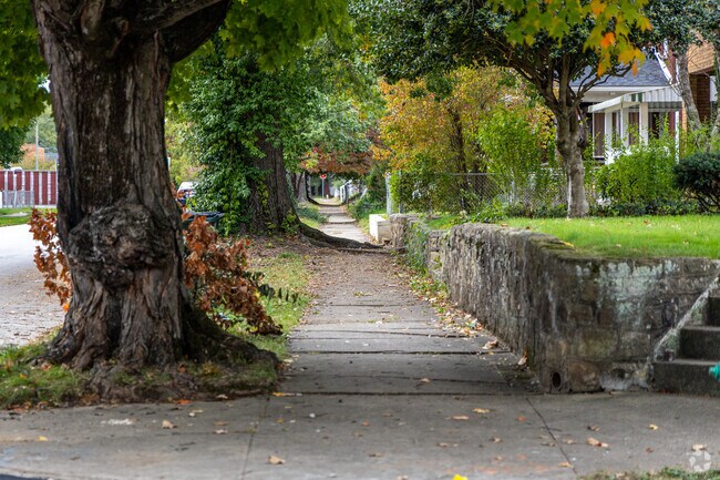 Historic streets and tree lined sidewalks throughout the West Huntington neighborhood.