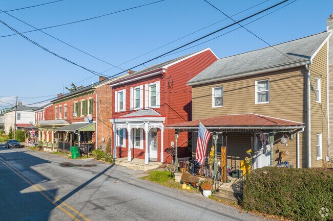 Colorful Row Homes in Maxatawny often include front porches.