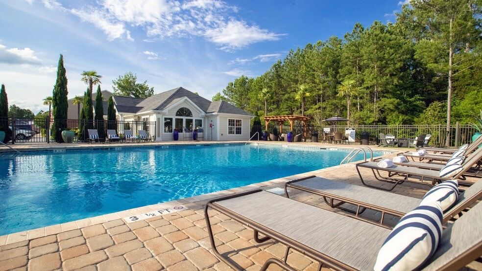 Lounge in luxury on our poolside loungers and savor the sun's warm embrace.