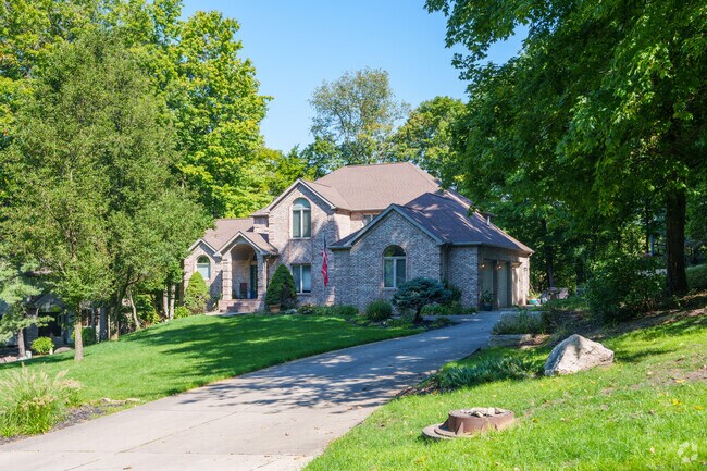 Large new traditional-style homes are common in the quieter areas of Sawmill.