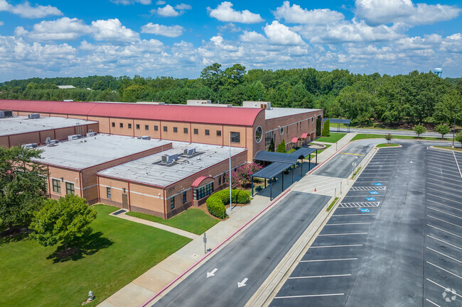Wide shot of the front of the school building