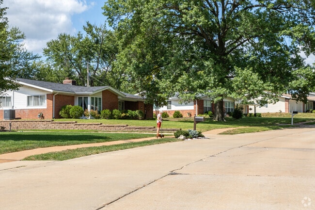 Sidewalks on residential streets make Ballwin a great place for dog walks.