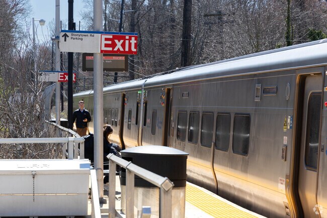 There is a small residents only parking lot near the Plandome Manor LIRR station.
