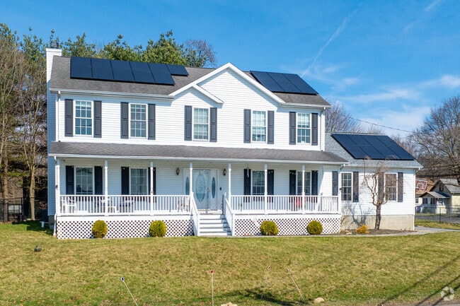 Luxurious lakefront colonials are common on Sand Shore Rd in Budd Lake.