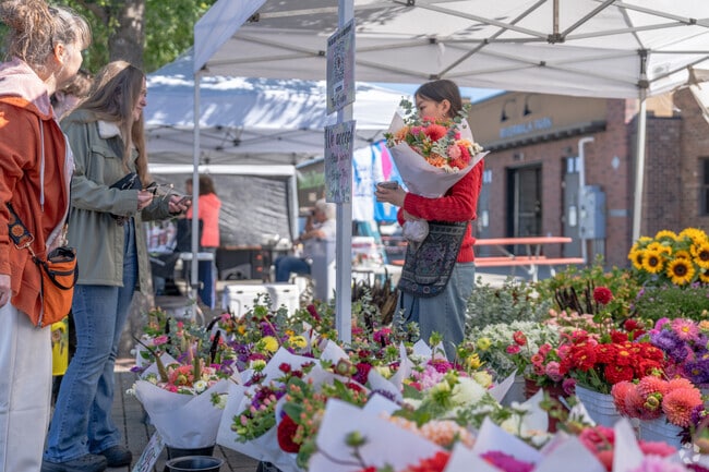 Buy a bouquet of flowers at Mount Vernon Farmers Market every Saturday near Big Lake.