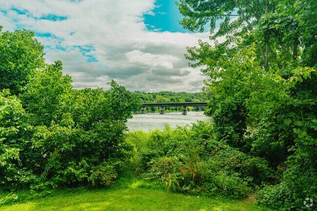 Lyman Point Park has wide green spaces over looking the river and various gardens.