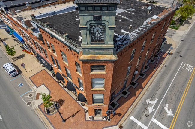 A clocktower overlooks Clinton's downtown area from the peak of Clinton Inn's cornice.