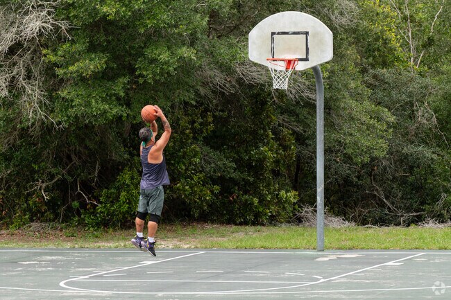 Pine Lakes residents enjoy the basketball court at Pine Forest Park.