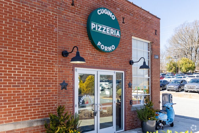 Discover Phillips Ave's culinary gem: Cugino Forno at Revolution Mill.