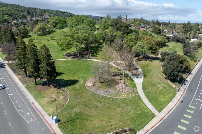 Almaden Meadows Park offers scenic hilltop views and open green spaces for recreation.